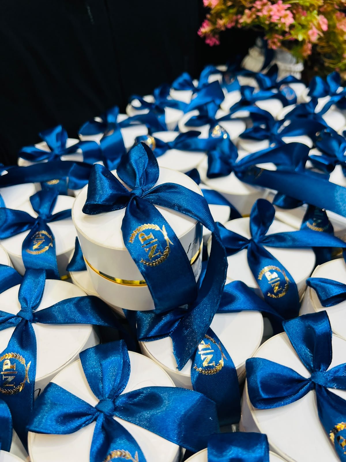 remium 3×3 Round Favor Box with Royal Blue Bow & Foil Printing